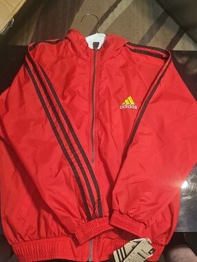 adidas Red Jacket with Black Stripe Accents and Yellow Logo